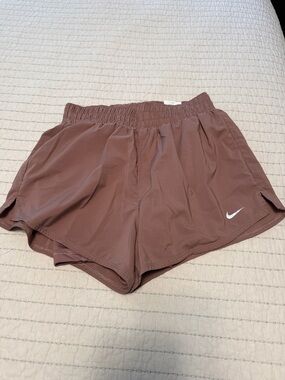 Nike Women's Mauve Athletic Running Shorts with White Swoosh